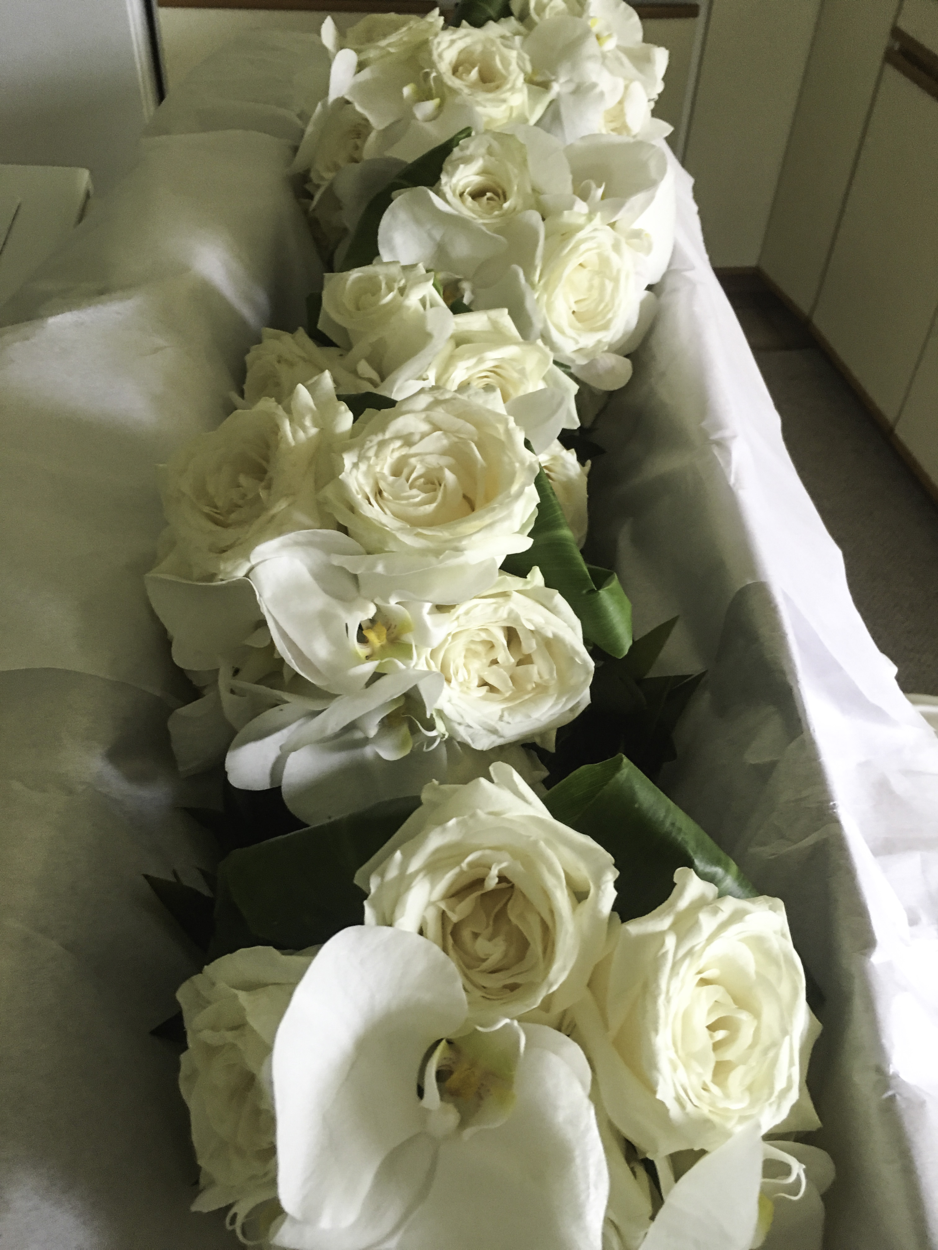 Bridesmaid's White Roses and Phalaenopsis Orchids